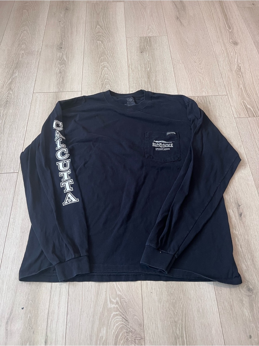 Salt Life Black Long Sleeve Pocket Tee with Calcutta Sleeve Print
